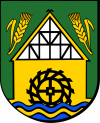 Plik:100px-Herb gminy Dźwierzuty.png